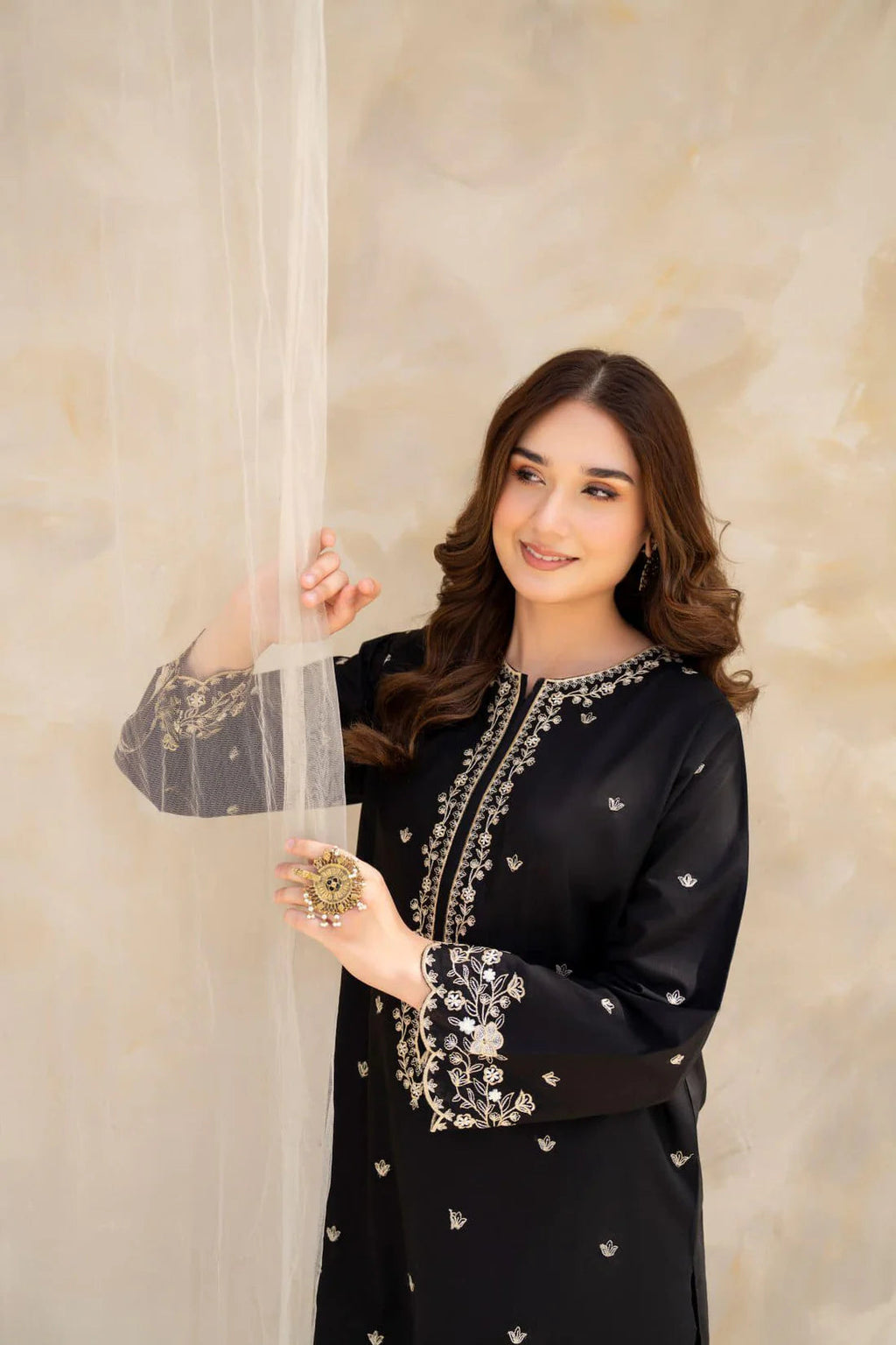 Unstitched LAAM Dhanak 3PC embroidered suit with embroidered sleeves and trouser – Winter 2025 collection.
