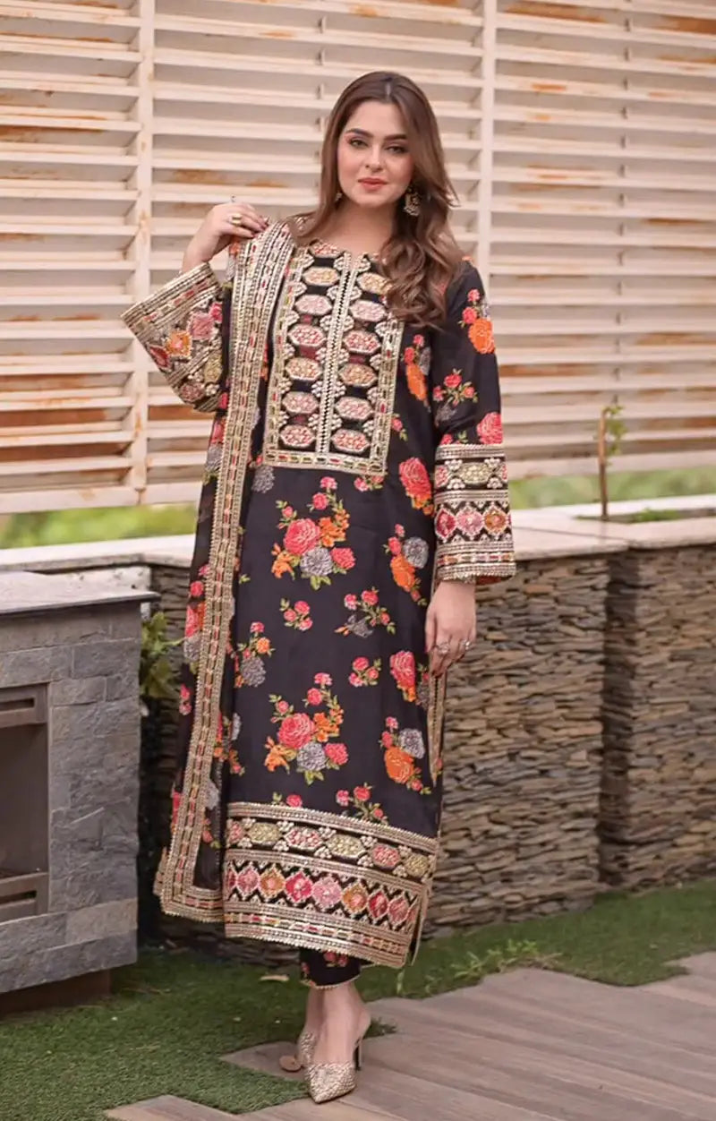 Aneela’s Collection Shamooz Silk 3PC embroidered suit with digital printed shirt, embroidered borders, and silk dupatta with 4-side cut work border.
