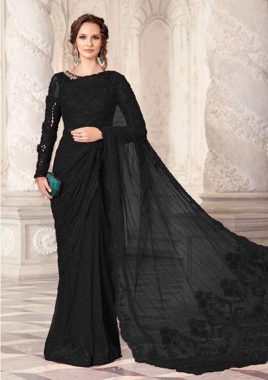 Maria B Black Net Saree with heavy embroidery, adda work, cutwork borders, tassel pallu, and silk petticoat – 2025 Exclusive.