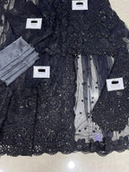 Maria B Black Net Saree with heavy embroidery, adda work, cutwork borders, tassel pallu, and silk petticoat – 2025 Exclusive.