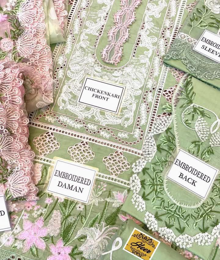 Crimson SEAFOAM Luxury Lawn 3pc embroidered suit with chikankari fabric, jacquard dupatta, and heavy embroidered cutwork details.