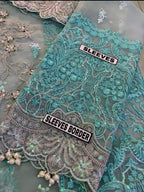 Elaaf Bridal Organza Embroidered 3 Piece Dress with stone handwork, tassels, pearls, and luxury organza dupatta – Wedding Luxury Collection 2025.
