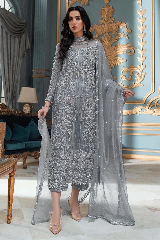LAAM embroidered net suit with satin silk, sequence work, fancy tussles, embroidered dupatta & plain trouser.
