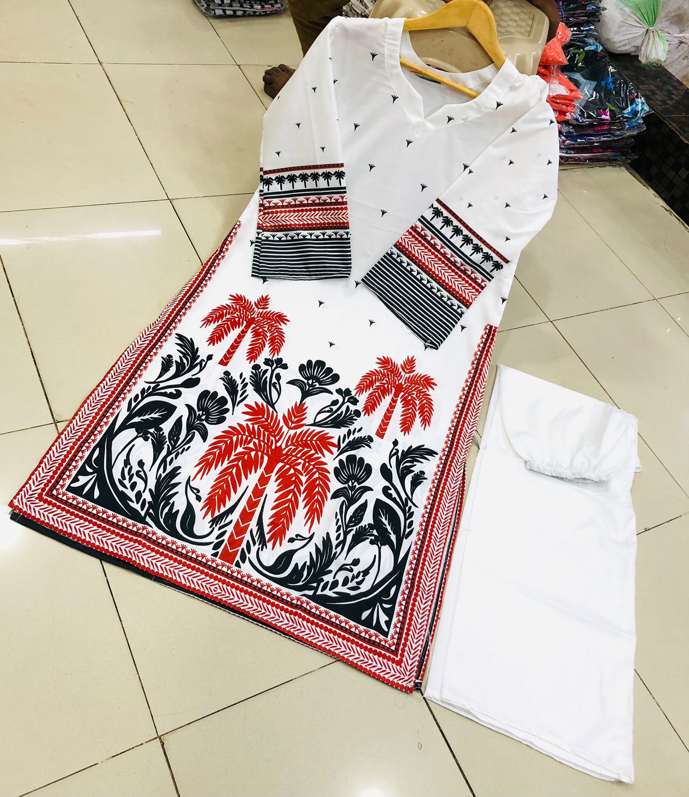 Co-Ord Set 2-Piece Suit in Swiss Lawn featuring digital printed long shirt and bell bottom trouser – trendy and stylish design