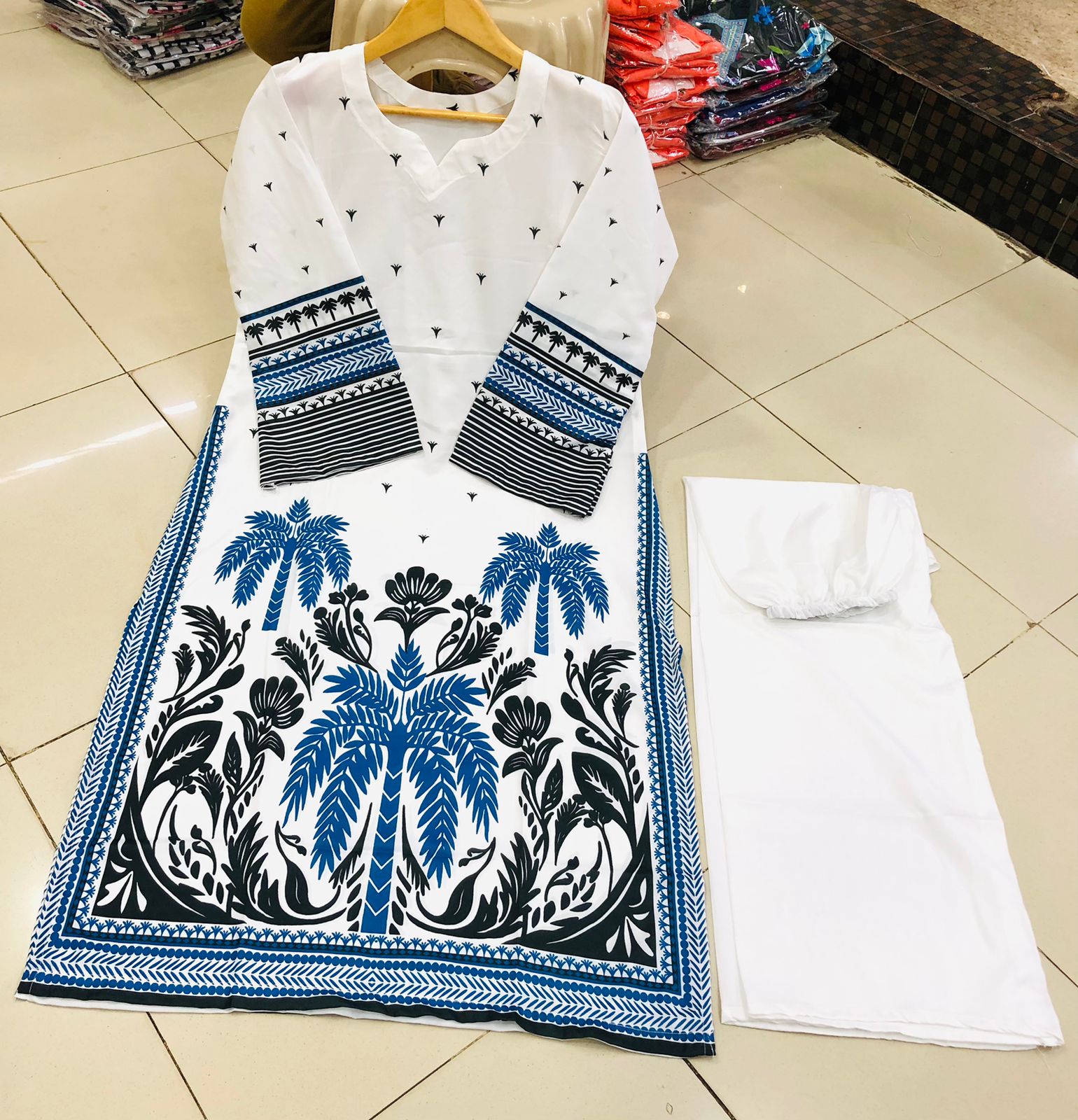 Co-Ord Set 2-Piece Suit in Swiss Lawn featuring digital printed long shirt and bell bottom trouser – trendy and stylish design