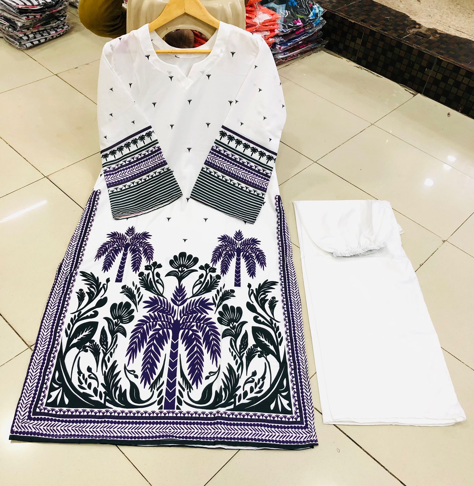 Co-Ord Set 2-Piece Suit in Swiss Lawn featuring digital printed long shirt and bell bottom trouser – trendy and stylish design