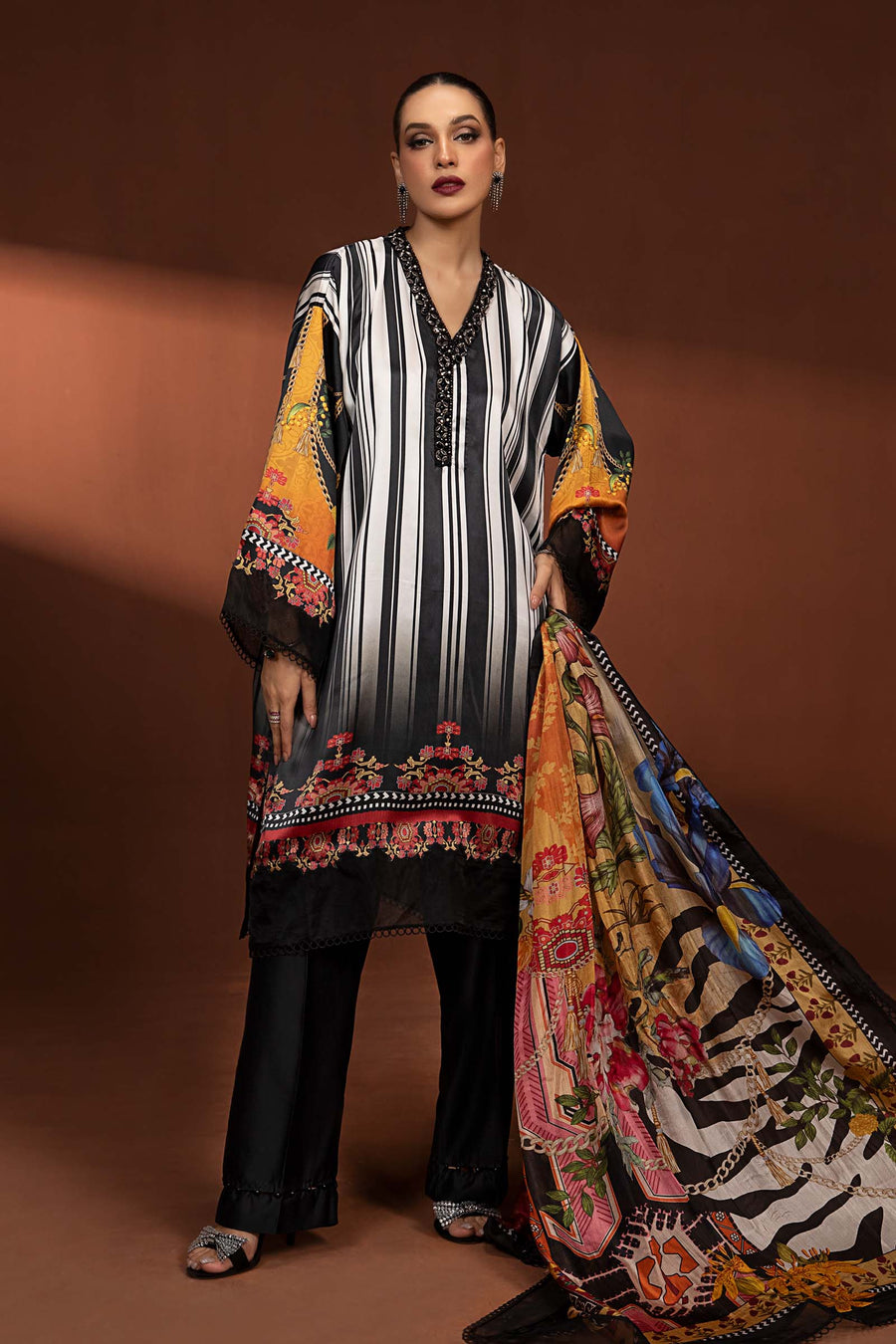 Maria B Shamoz Silk 2PC unstitched suit with printed shirt and trouser in fine quality fabric.